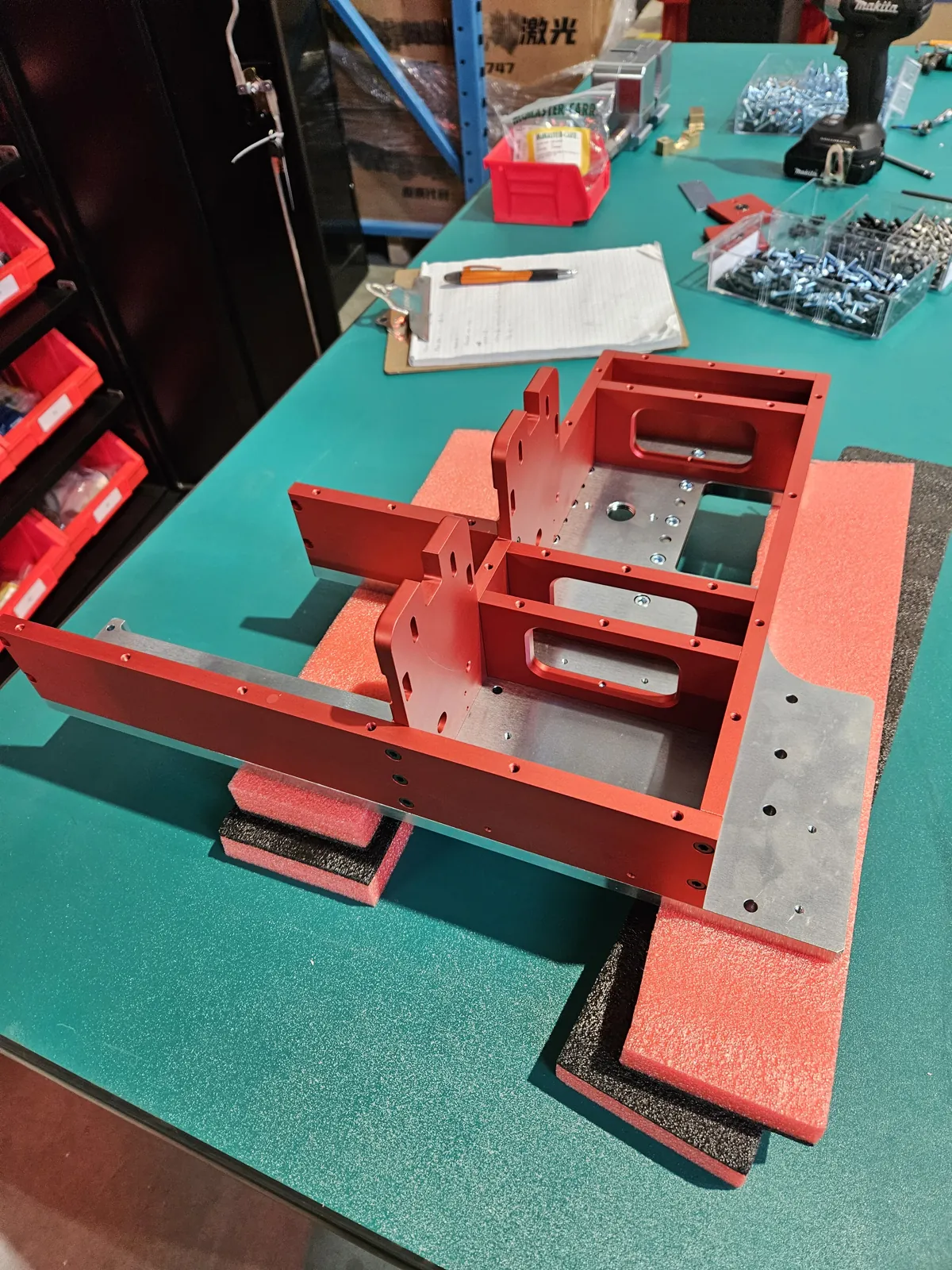Red powder-coated fabricated steel frame
